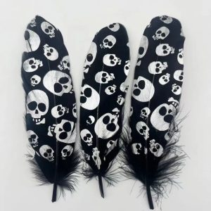 Plumes Décoratives Noires à Motif Crânes Blancs